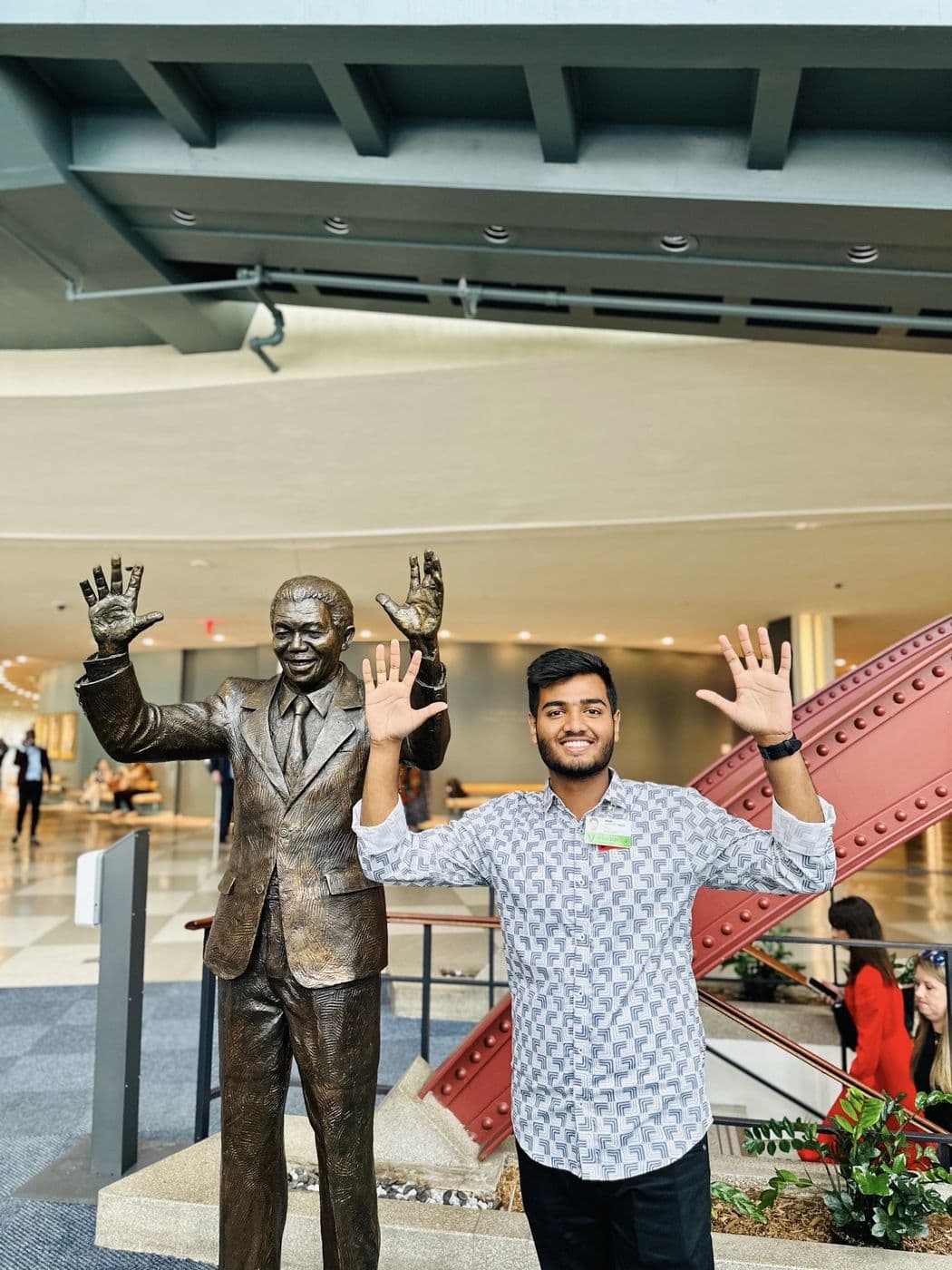 With the Nelson Mandela statue at the UN